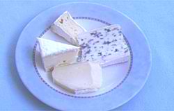 A selection of fine cheeses to be enjoyed prior to dessert.