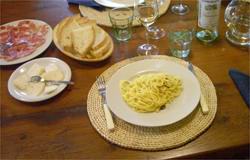 Fresh pasta with white truffles, pecorino with truffles and home-made prosciutto